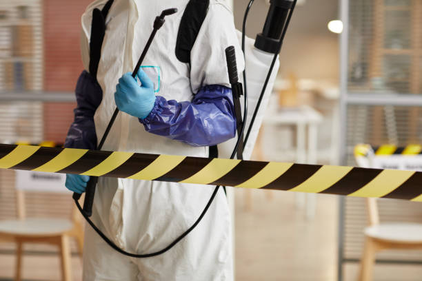 Professional Biohazard Cleanup technician working in Hull, IA